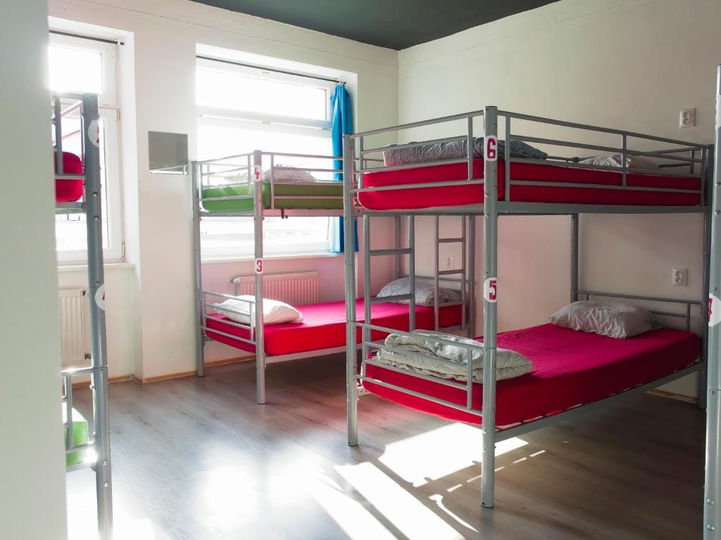 Postel nebo postele na pokoji v ubytování Urban Elephants Hostel
