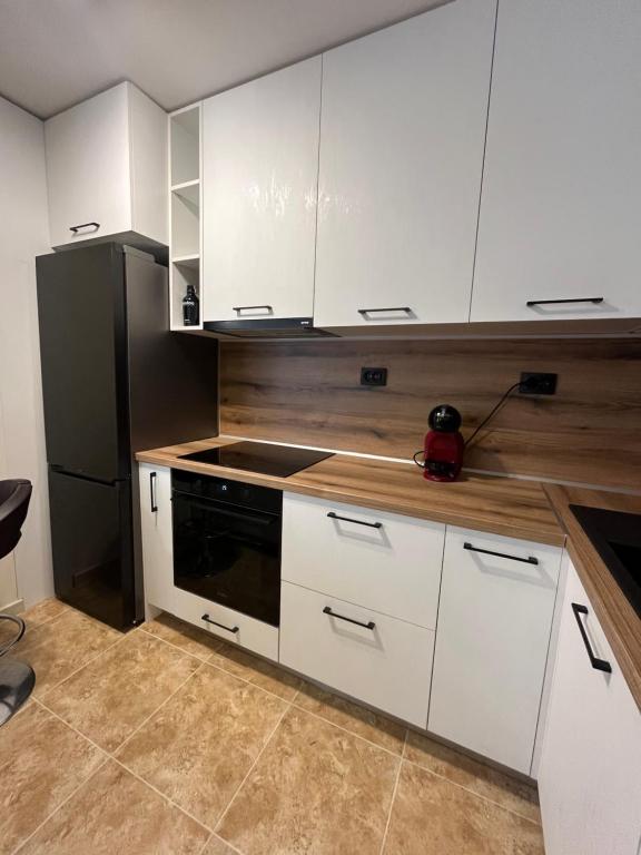 Kuchyň nebo kuchyňský kout v ubytování River park 2 bedroom apartment