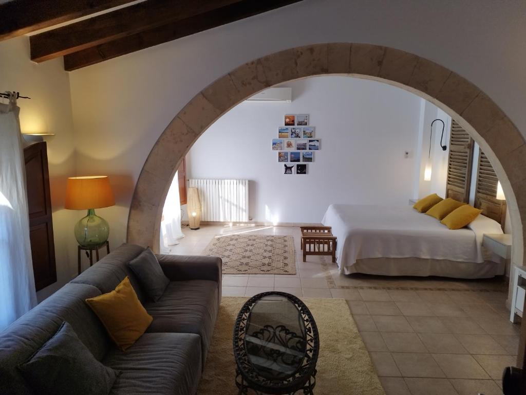 Postel nebo postele na pokoji v ubytování PETIT HOTEL ALGAIDA