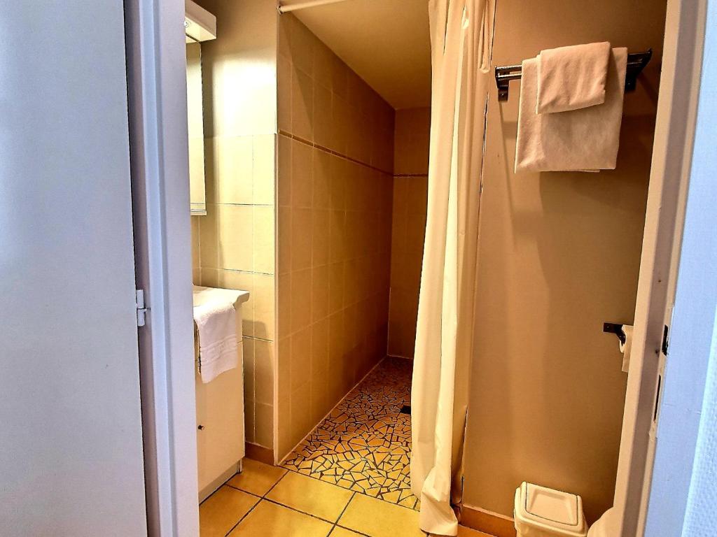 Koupelna v ubytování Atlantis Hôtel