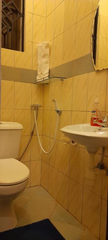Koupelna v ubytování Aivilo Home