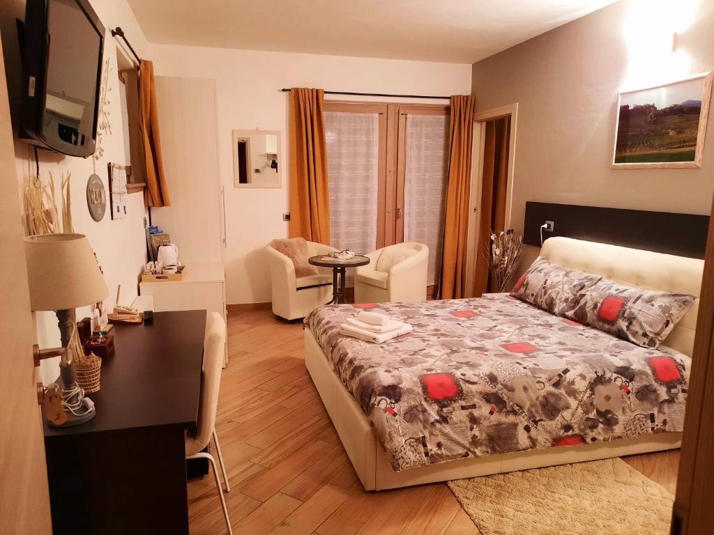 Postel nebo postele na pokoji v ubytování Il Vigneto