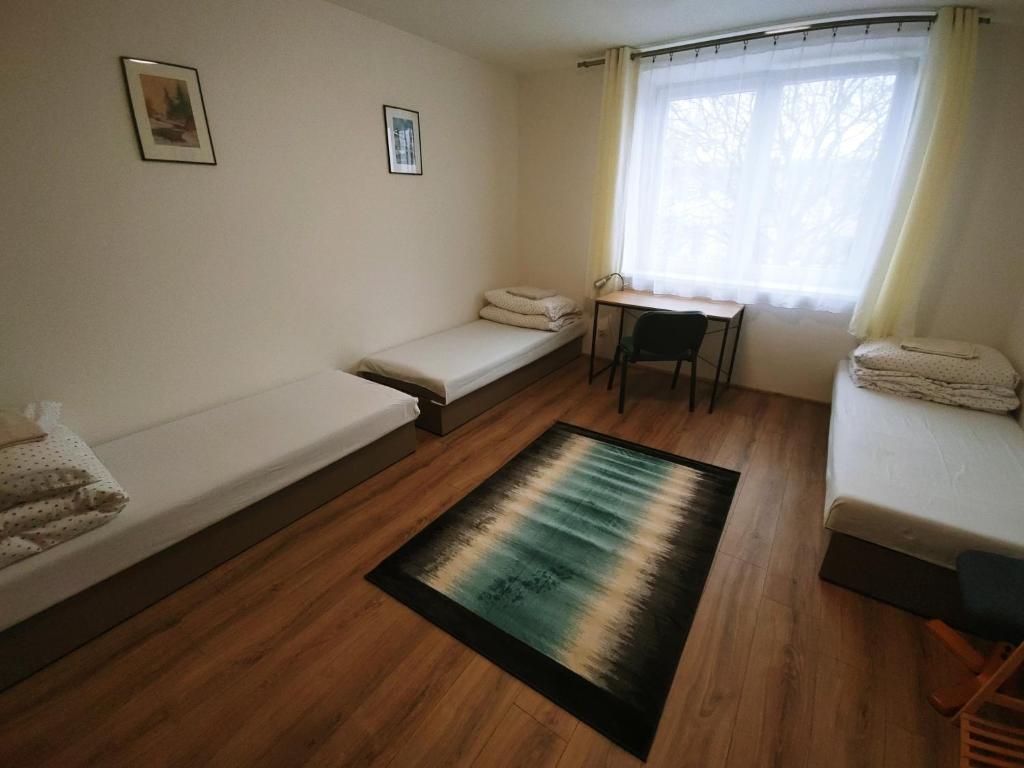 Postel nebo postele na pokoji v ubytování PIANO STUDIO