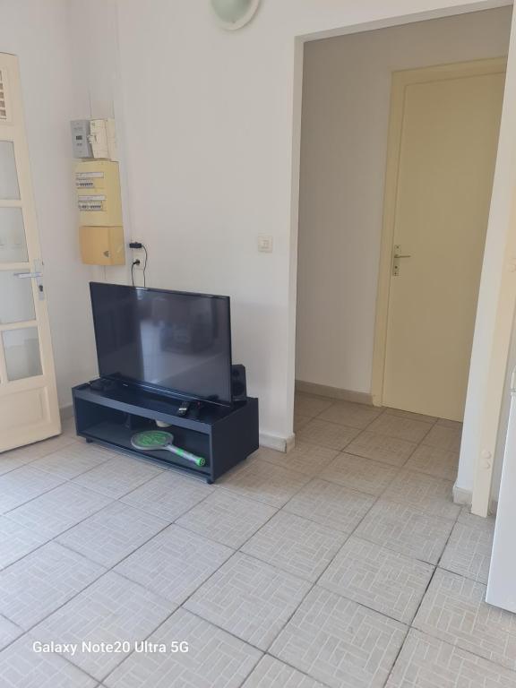 TV a/nebo společenská místnost v ubytování Villa Anse CLEMENCE 2