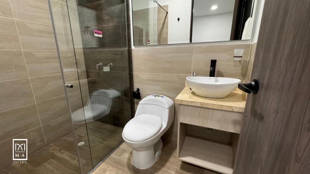 Koupelna v ubytování M A Hotel