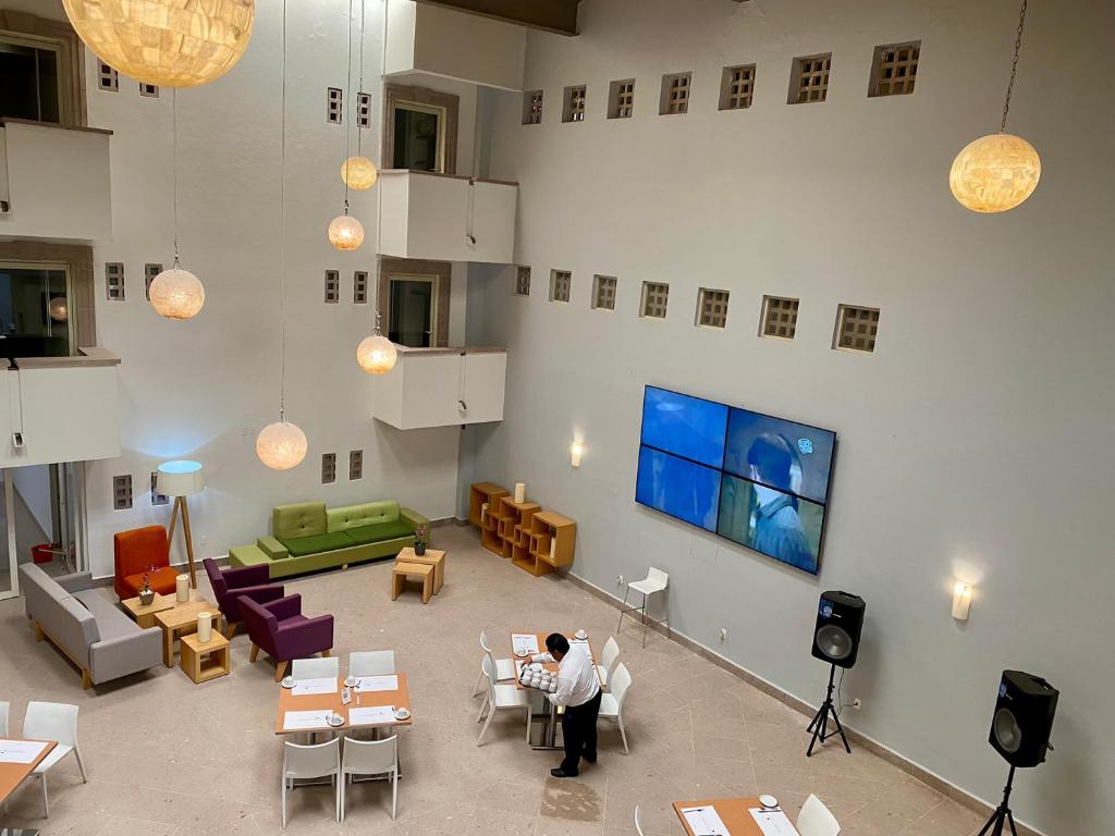 TV a/nebo společenská místnost v ubytování InHouse León
