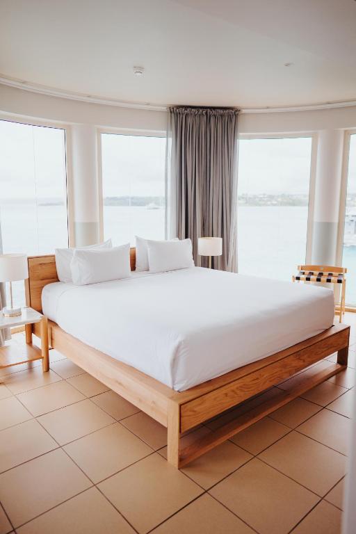 Postel nebo postele na pokoji v ubytování Grand Hotel & Casino