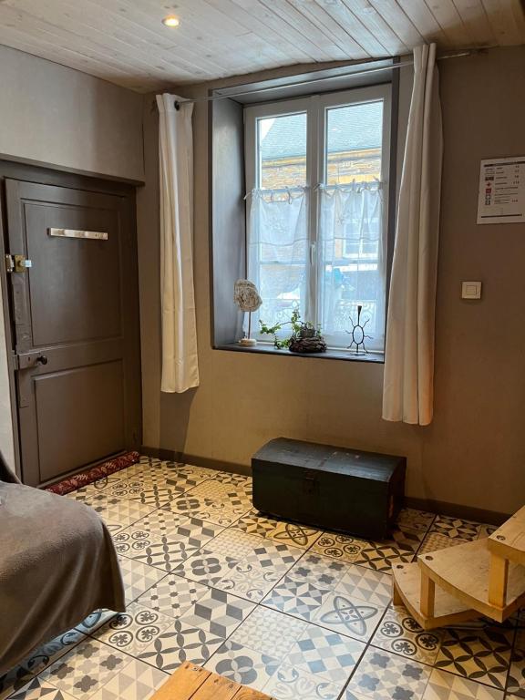 Posezení v ubytování Gîte Pierre et Meuse