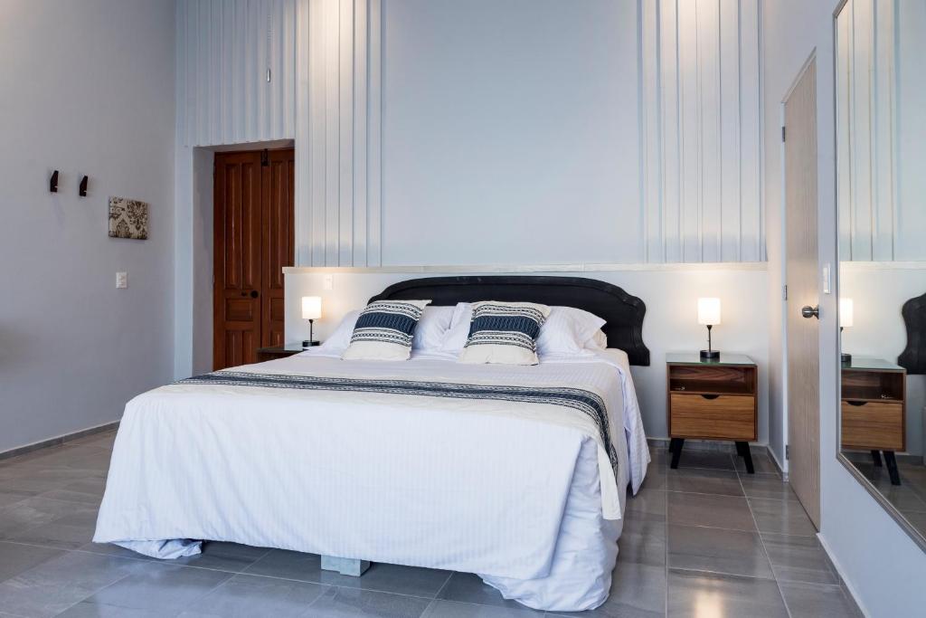 Postel nebo postele na pokoji v ubytování Casa Murmullos