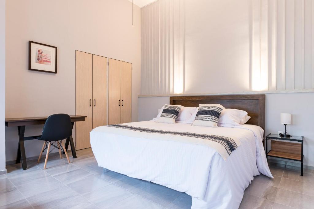 Postel nebo postele na pokoji v ubytování Casa Murmullos