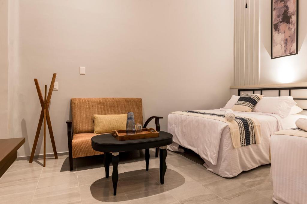 Postel nebo postele na pokoji v ubytování Casa Murmullos