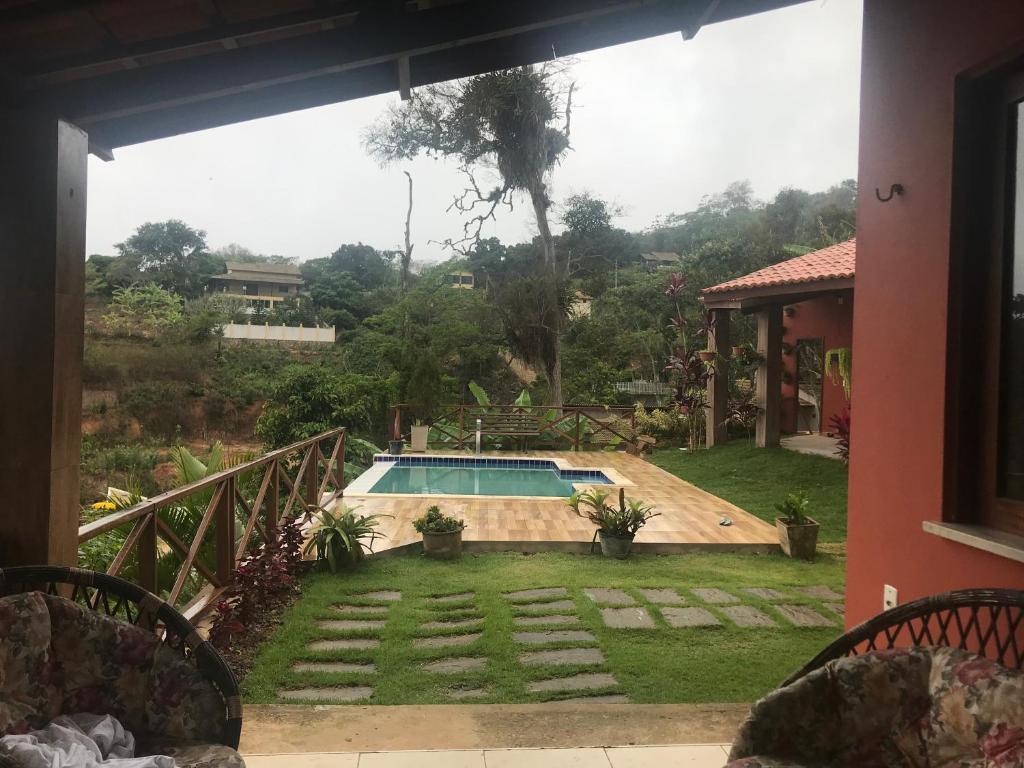a view of a swimming pool from a house at Sitio Maravilha in Mulungu