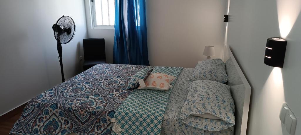 Postel nebo postele na pokoji v ubytování Residência Águia