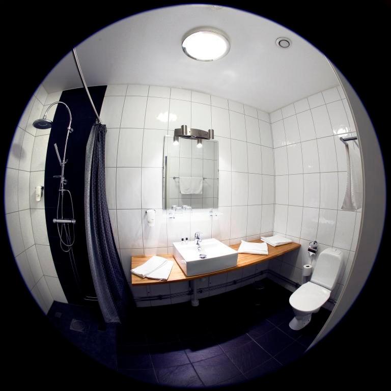 Koupelna v ubytování Adels Hotel