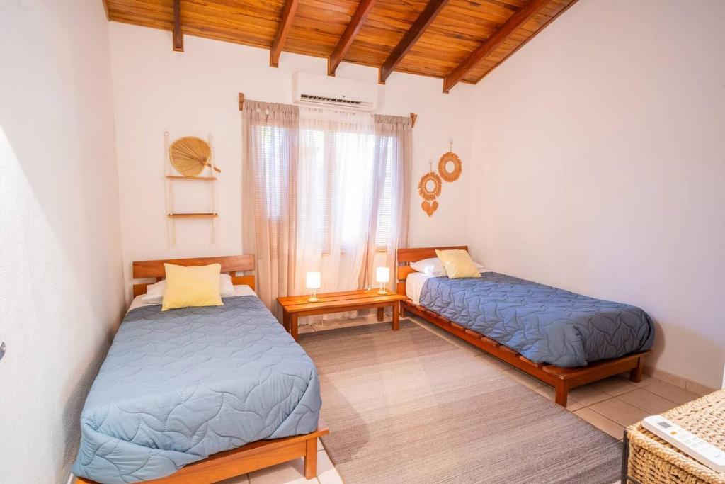 Postel nebo postele na pokoji v ubytování Curiol Boutique Hotel & Lounge