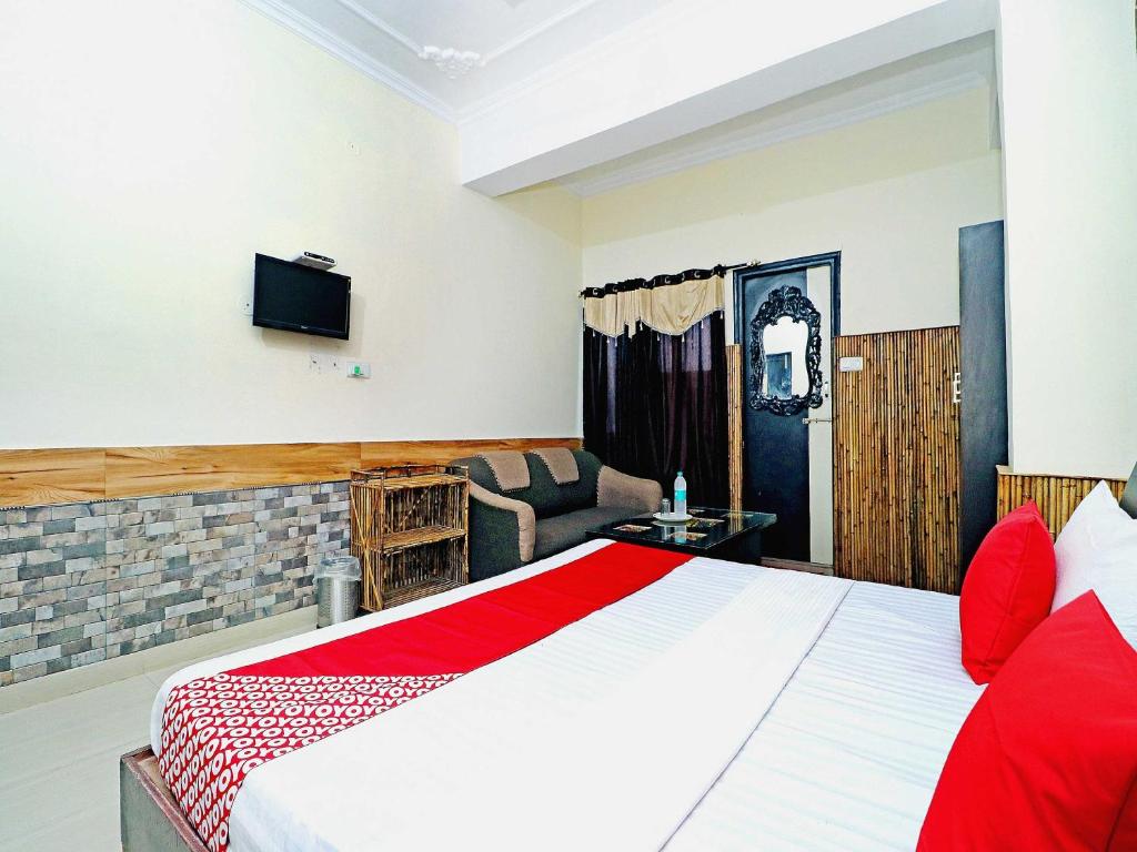 Postel nebo postele na pokoji v ubytování Hotel O Welcome Lounge