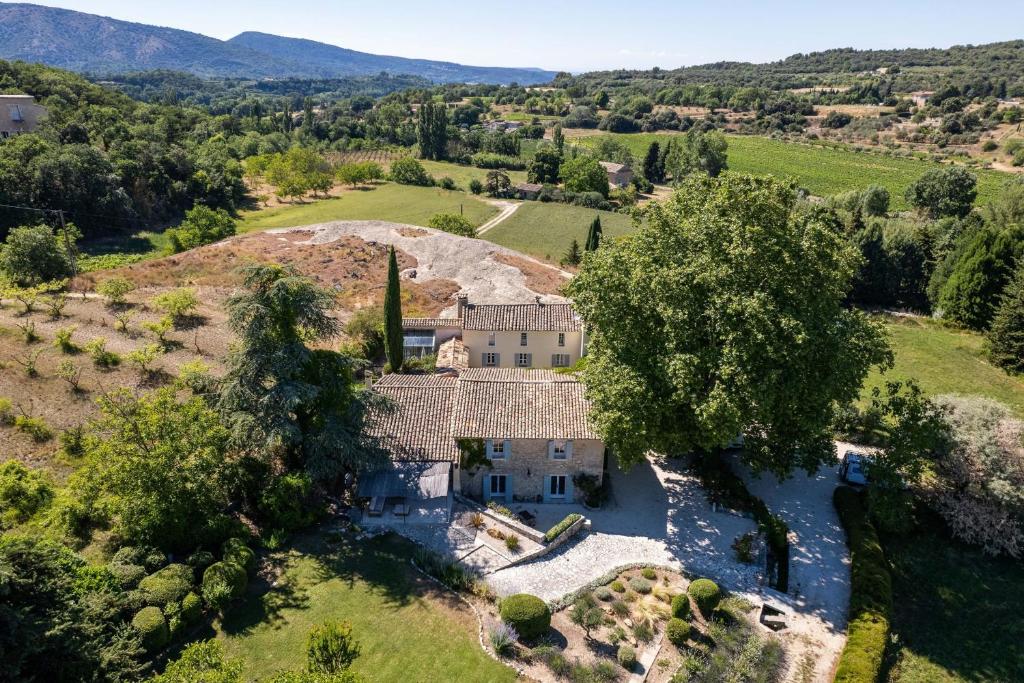 an aerial view of an estate with a large house at Villa Les Saffres in Malaucene in Malaucène