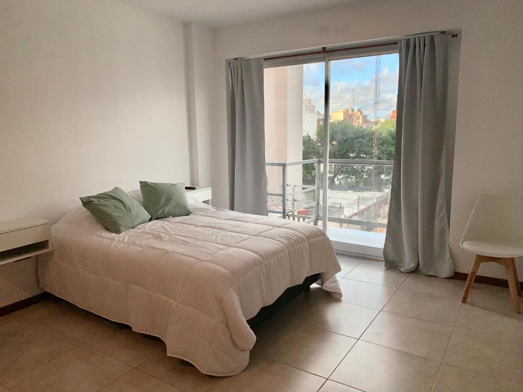 Postel nebo postele na pokoji v ubytování Monoambiente nuevo y luminoso en Flores