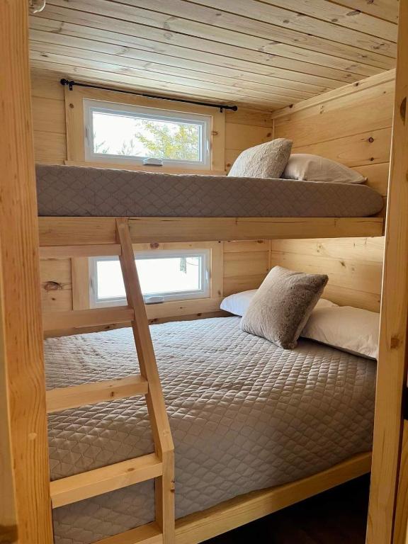 Postel nebo postele na pokoji v ubytování Chalet La P'tite Paix