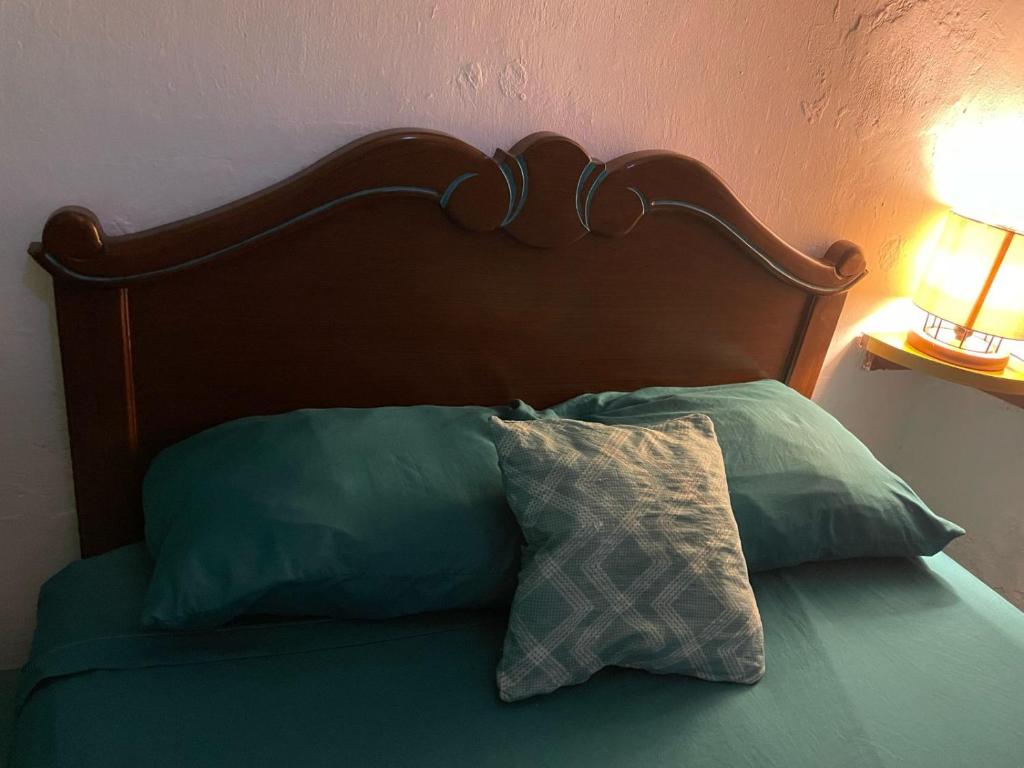 Postel nebo postele na pokoji v ubytování La Casa del Kéej Hostel