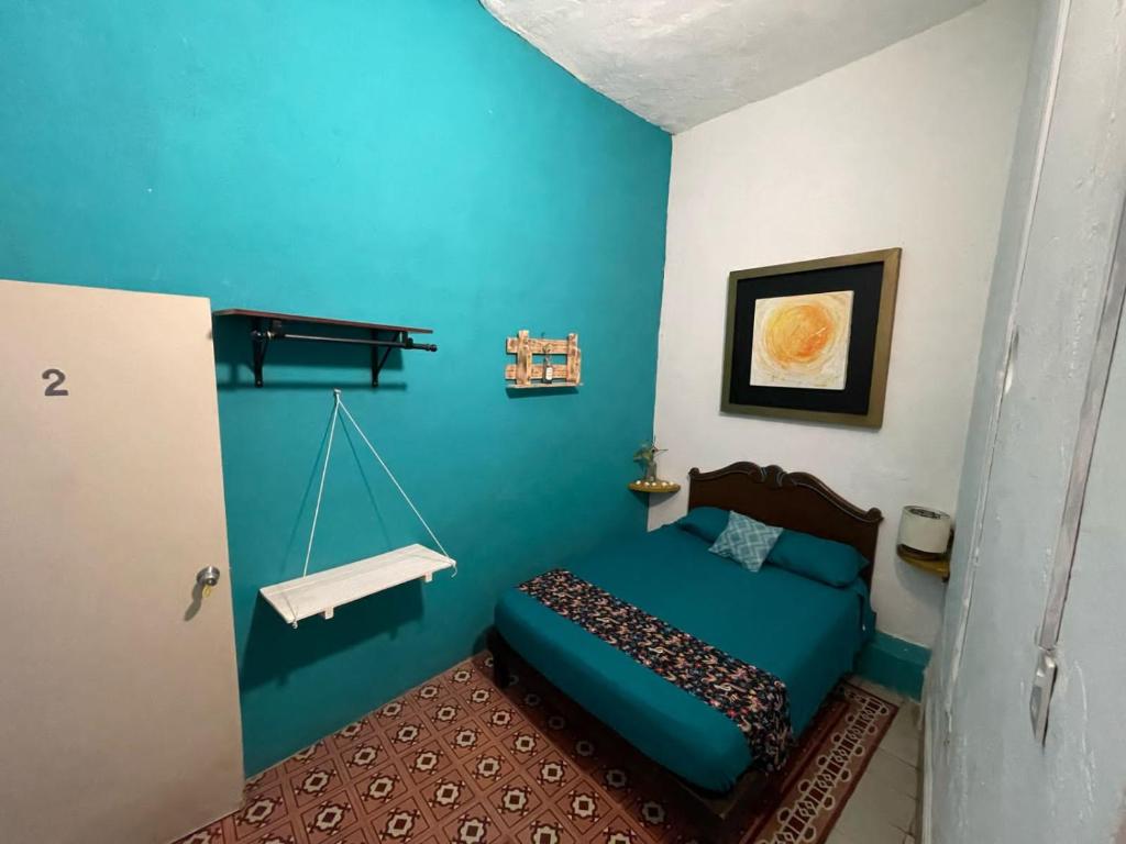 Postel nebo postele na pokoji v ubytování La Casa del Kéej Hostel