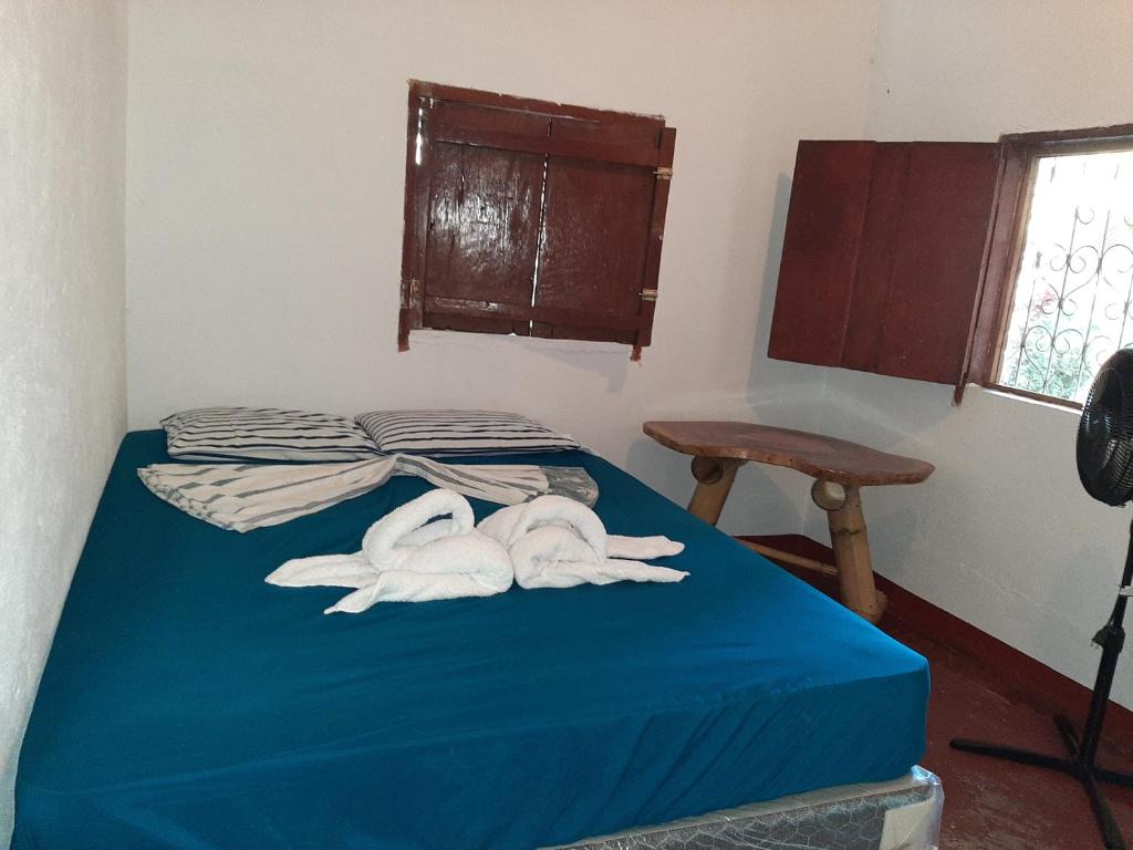 Voodi või voodid majutusasutuse Playa Casa Nohelia toas