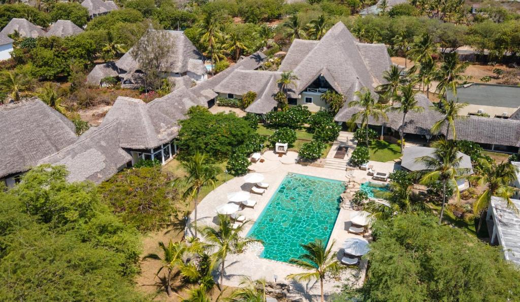 an aerial view of a house with a swimming pool at Lion in the Sun Billionaire Retreat Malindi in Malindi