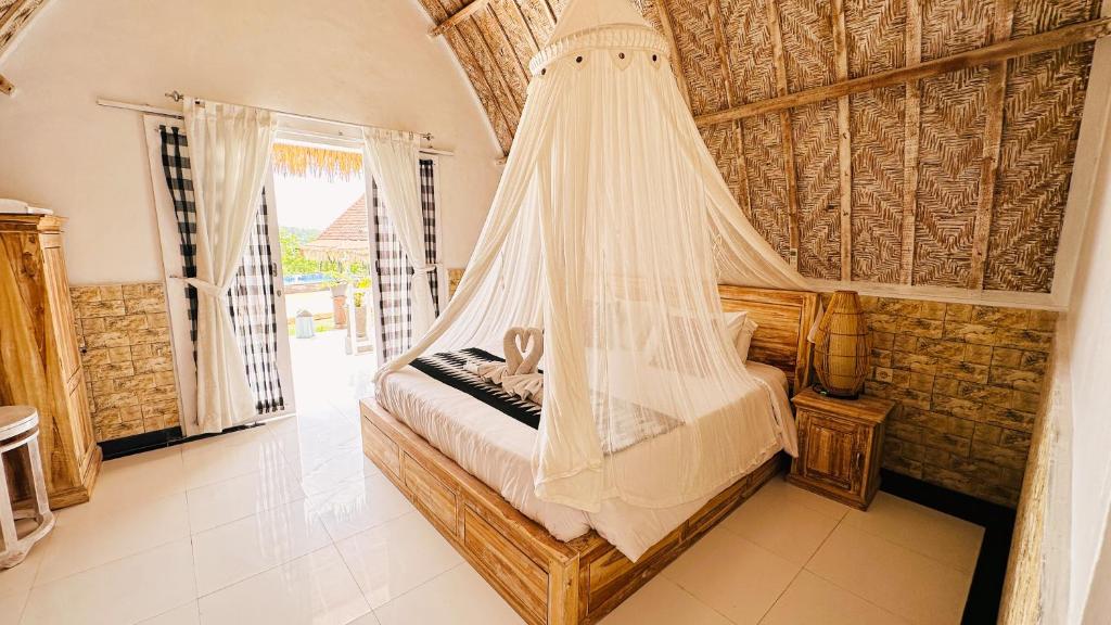 Tempat tidur dalam kamar di Penida Hills