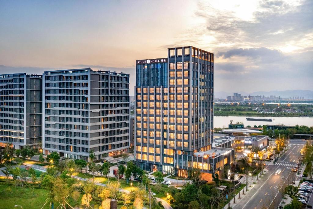 an aerial view of a city with tall buildings at Atour S Hotel Ningbo Binjiang Olympic Sports Center in Ningbo