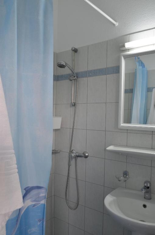 Koupelna v ubytování Metaxa Apartments