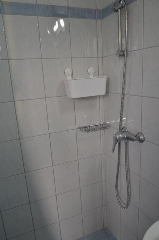 Koupelna v ubytování Metaxa Apartments