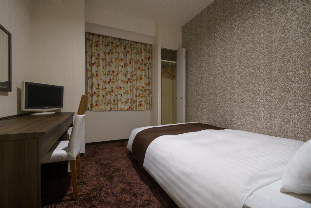 TV a/nebo společenská místnost v ubytování Hotel Centmain Nagoya