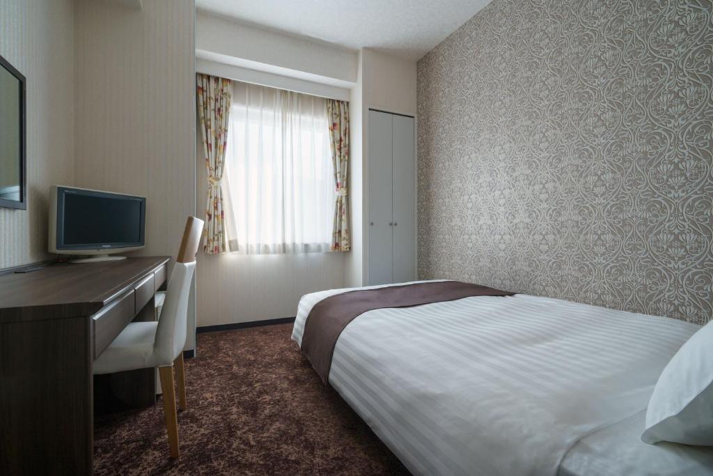 TV a/nebo společenská místnost v ubytování Hotel Centmain Nagoya