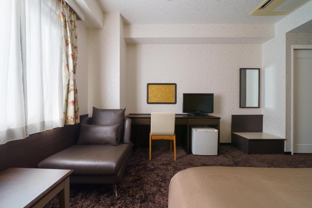 TV a/nebo společenská místnost v ubytování Hotel Centmain Nagoya