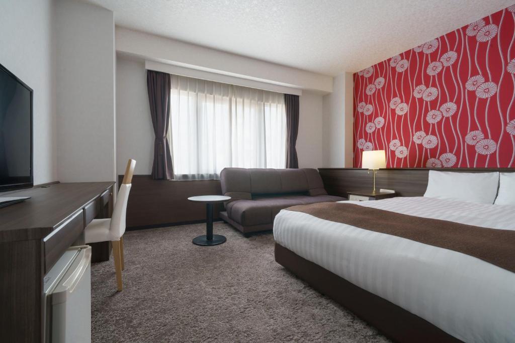 TV a/nebo společenská místnost v ubytování Hotel Centmain Nagoya