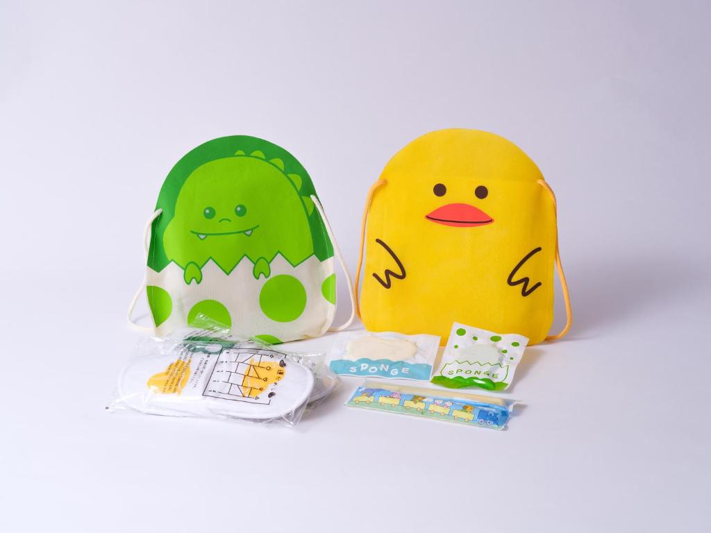 two easter eggs with faces painted on them and a box of candy at APA Hotel Tennoji Ekimae in Osaka