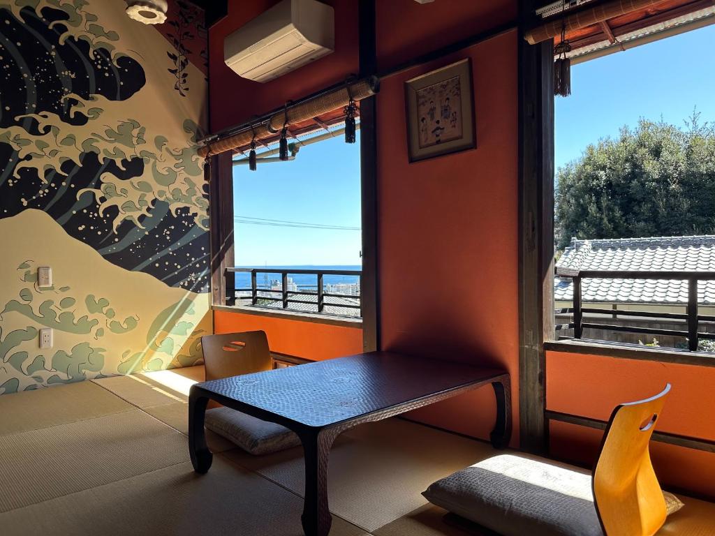 Posezení v ubytování Atami Ikyuan 熱海一休庵