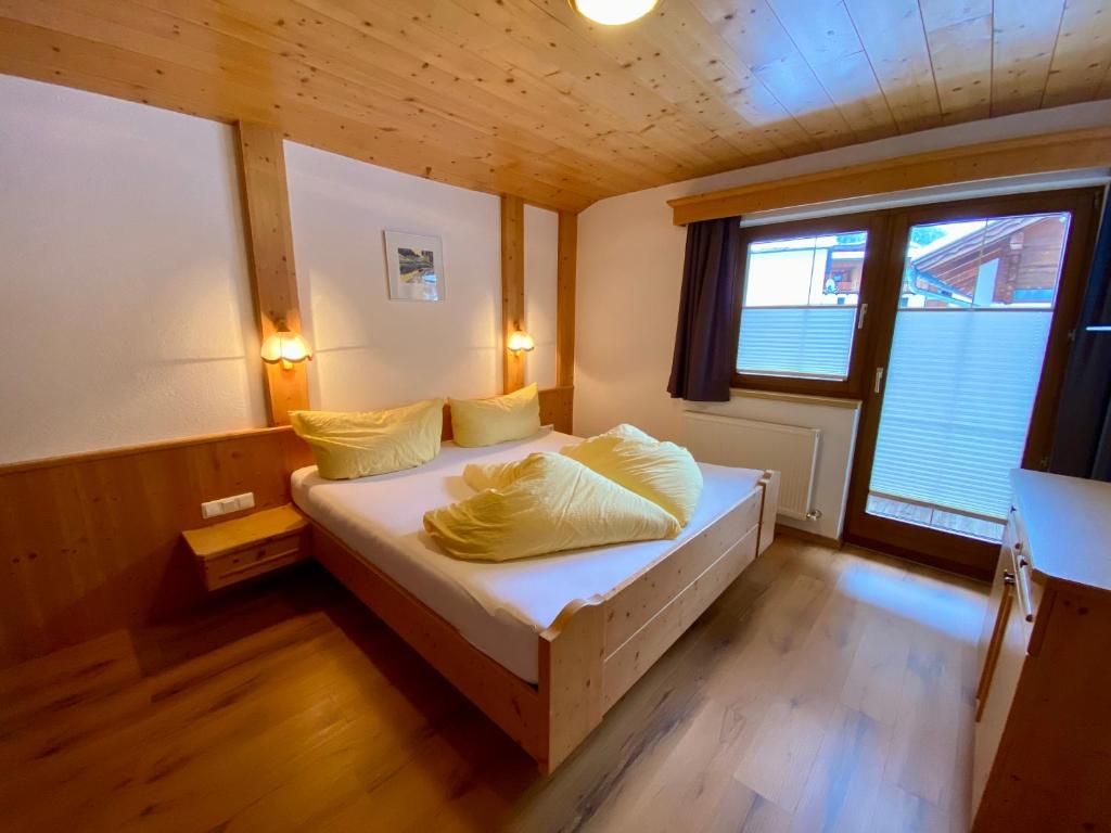 Postel nebo postele na pokoji v ubytování Apartment Seespitz