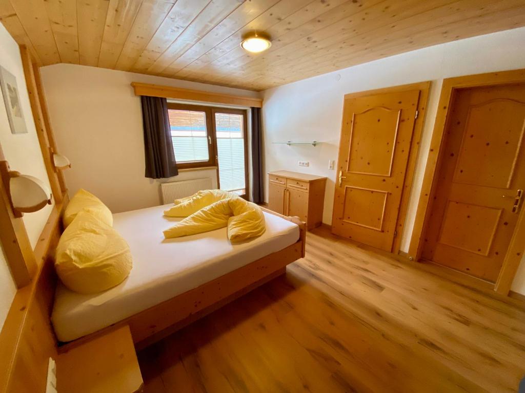 Postel nebo postele na pokoji v ubytování Apartment Seespitz