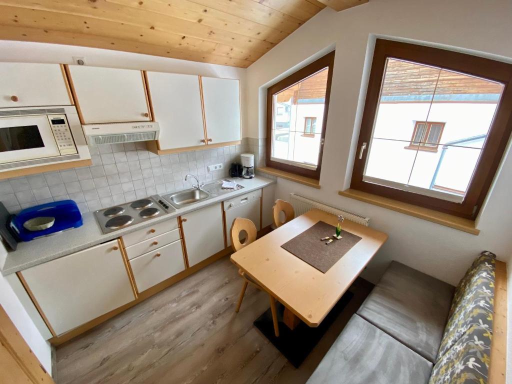 Kuchyň nebo kuchyňský kout v ubytování Apartment Seespitz