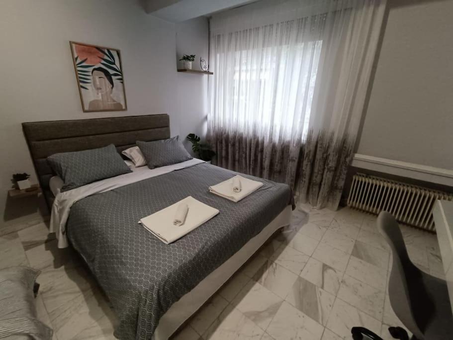 A bed or beds in a room at Callisto studio