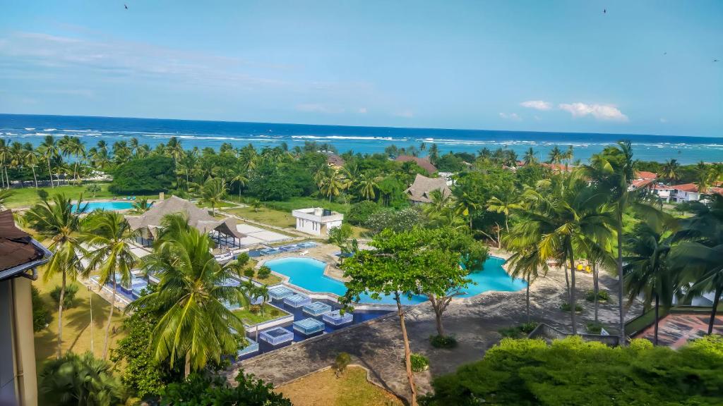an aerial view of the resort and the ocean at Harmony Homes Beachfront in Diani Beach