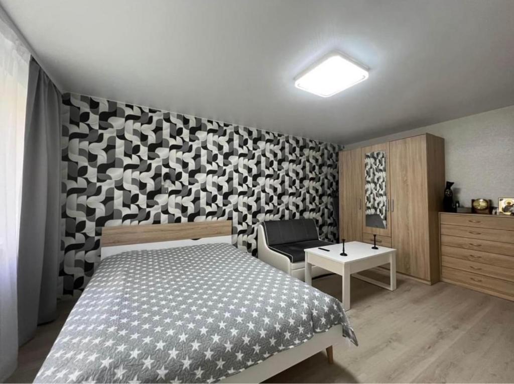 Postel nebo postele na pokoji v ubytování Narva Apartment AV
