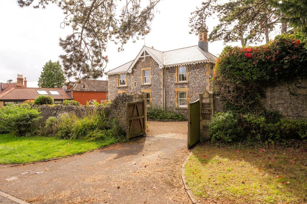 a house with a gate in front of it at The Mews Flat, near Clifton Suspension Bridge in Bristol