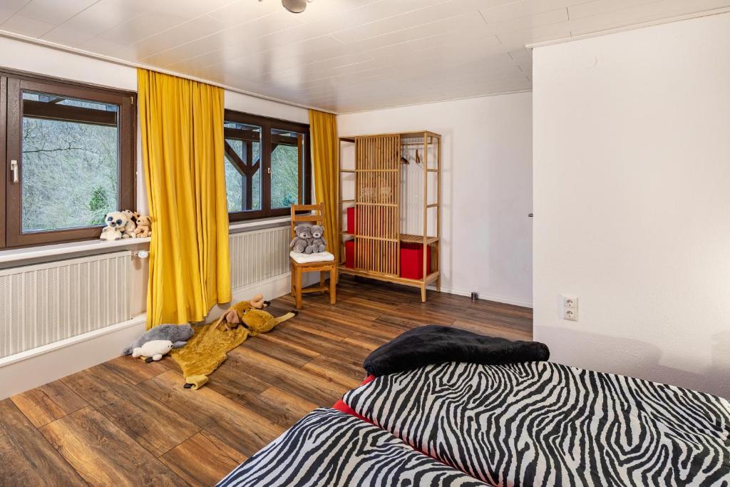 Postel nebo postele na pokoji v ubytování Ferienwohnung Waldeckchen