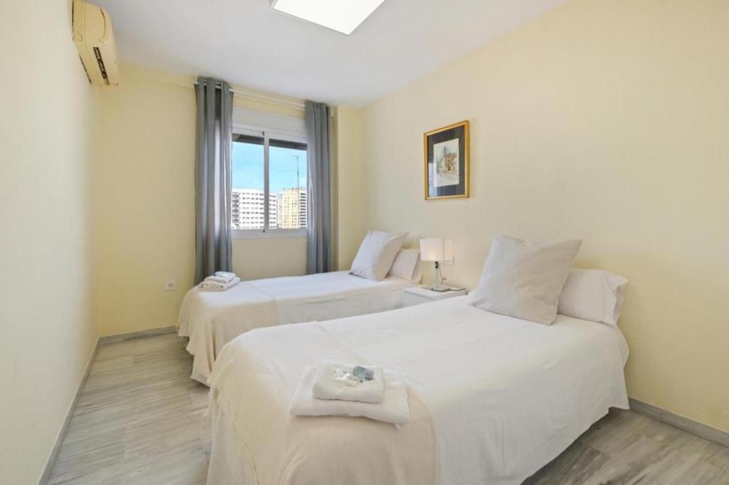 Posteľ alebo postele v izbe v ubytovaní Apartamento en calle cuarteles de dos habitaciones