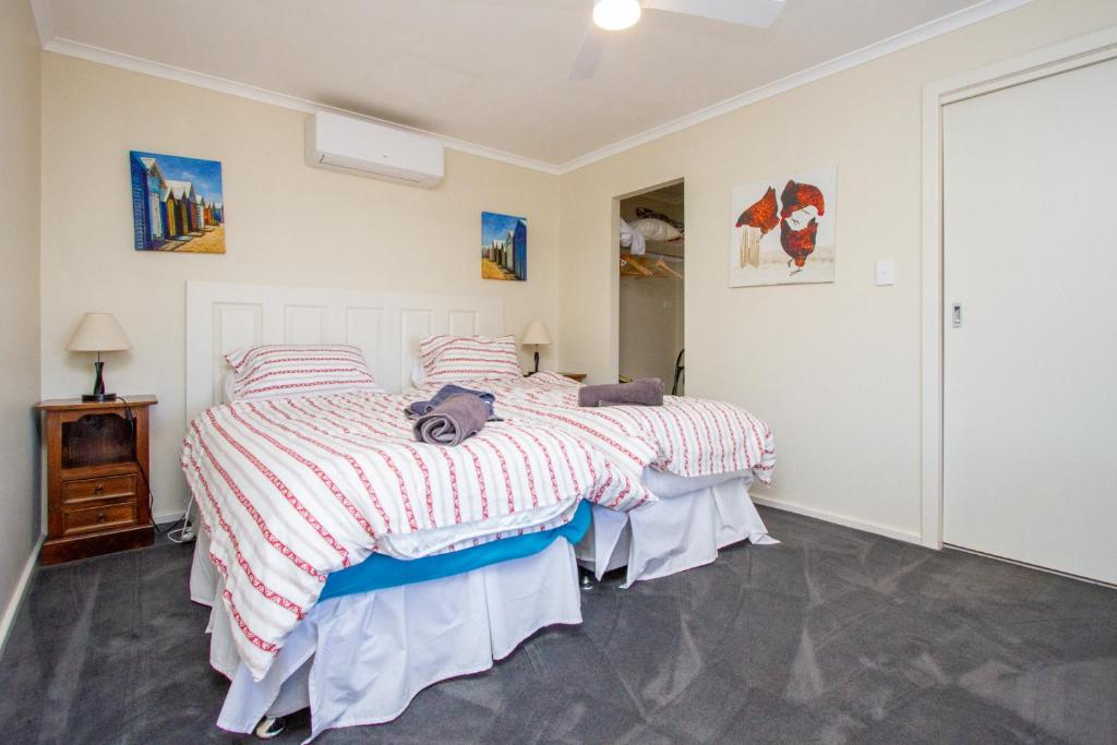 Postel nebo postele na pokoji v ubytování Pecan Hill BNB
