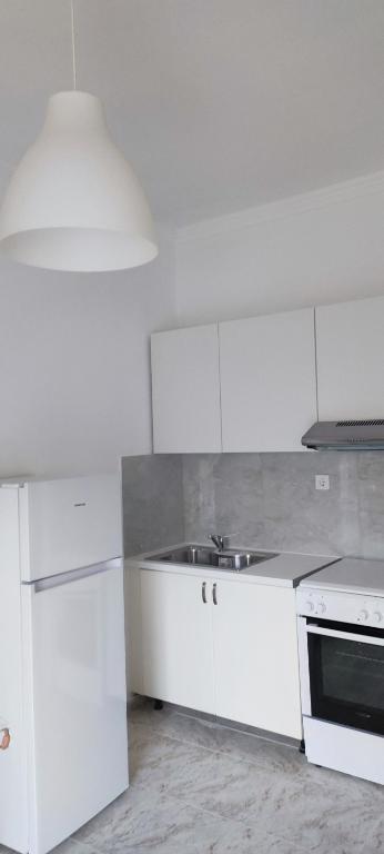 Kuchyň nebo kuchyňský kout v ubytování Top Holidays Apartments