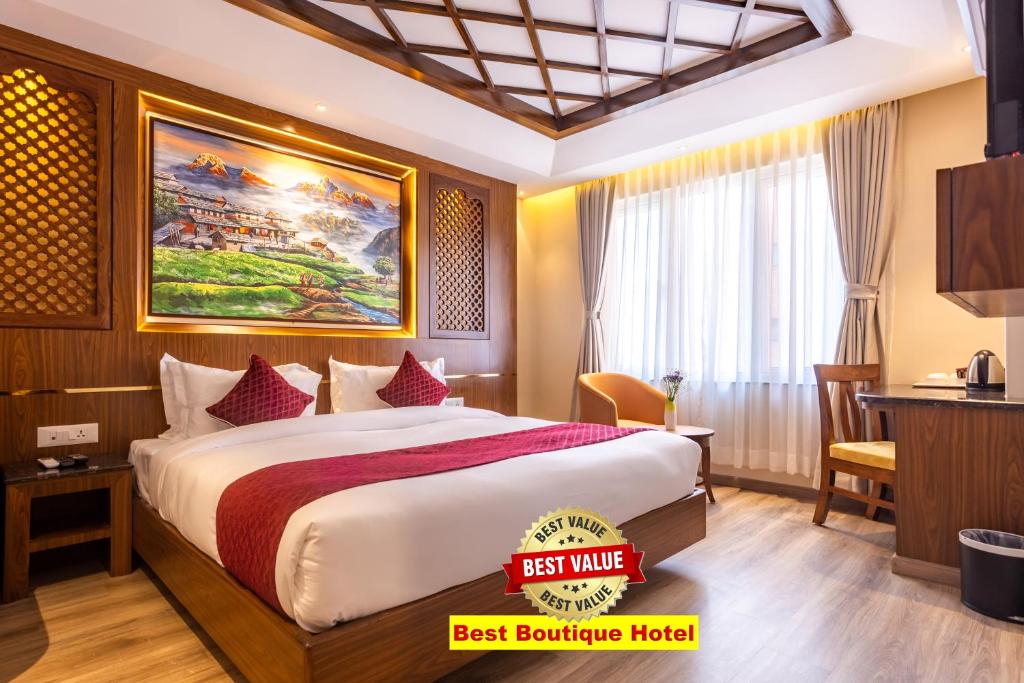 Postel nebo postele na pokoji v ubytování Kailash Boutique Hotel