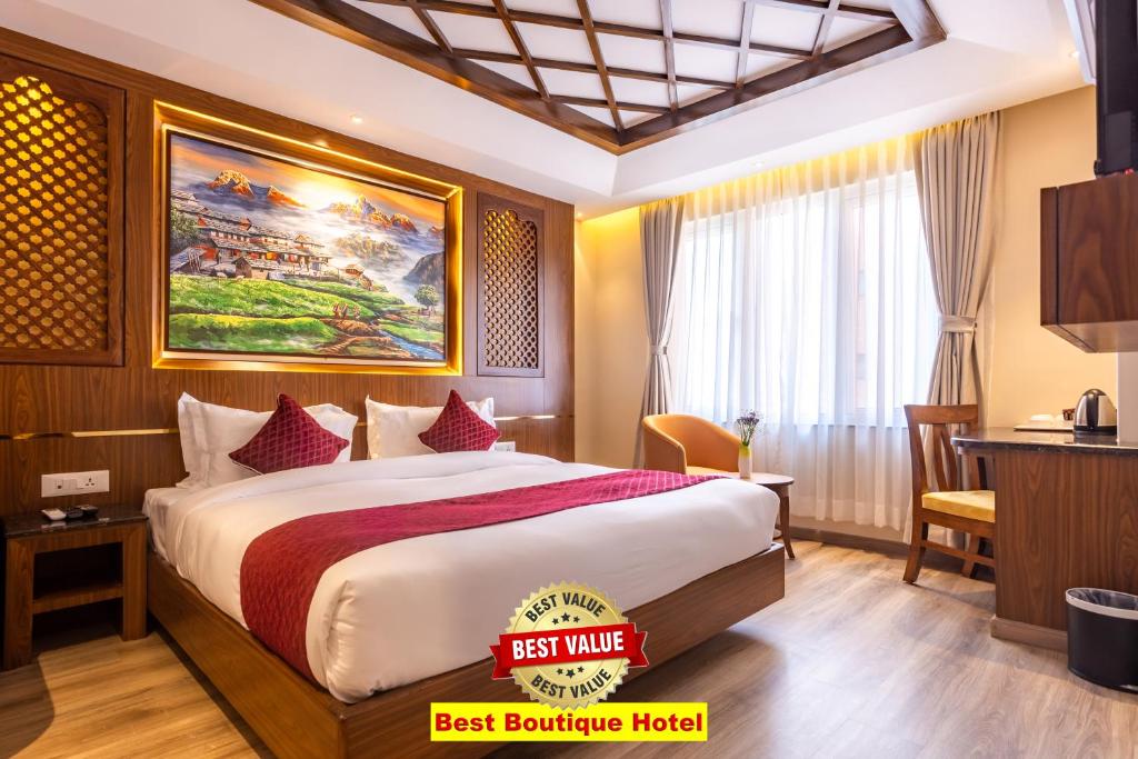 Postel nebo postele na pokoji v ubytování Kailash Boutique Hotel